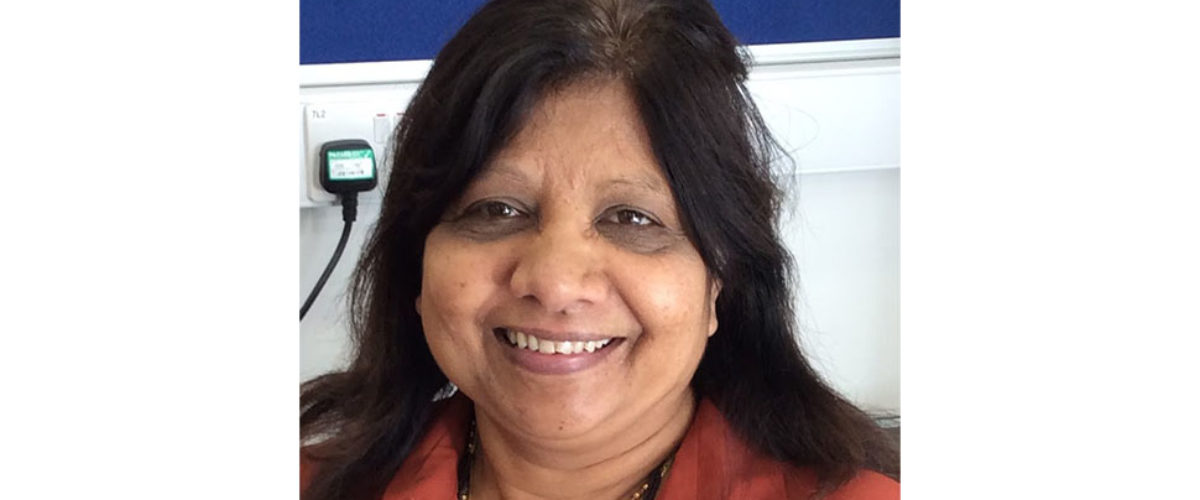 Headshot of Finance Manager Sue Mistry smiling at the camera